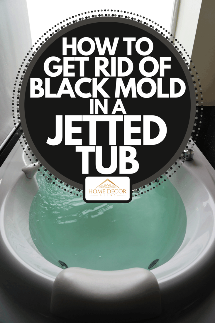 An empty white massaging jetted bathtub with turquoise water, How To Get Rid Of Black Mold In A Jetted Tub