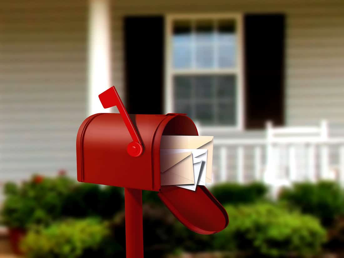Mail box in front of a house