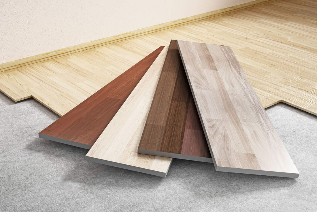 Parquet choices on the ground. Wood floor installation concept, Does Wood Laminate Need Underlay?