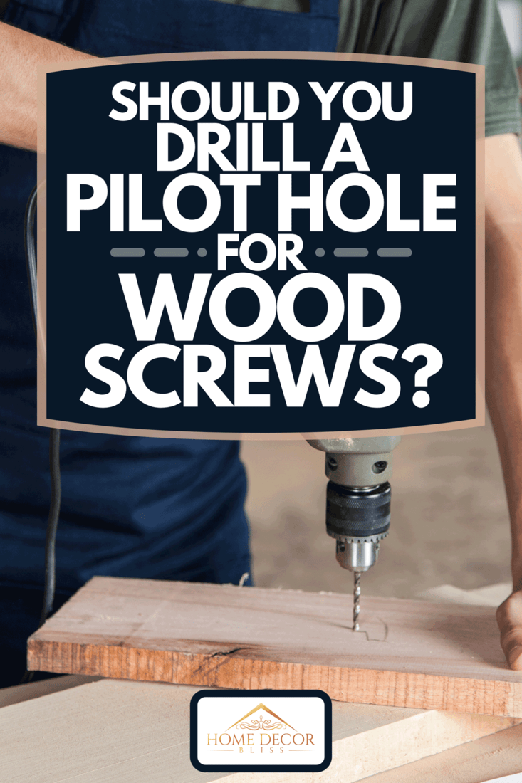 A man working with a drill, Should You Drill A Pilot Hole For Wood Screws?