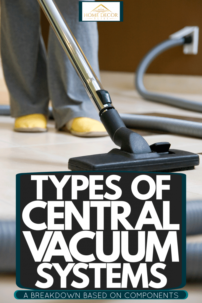 A woman using a central vacuum system inside the living room, Types Of Central Vacuum Systems - A Breakdown Based On Components