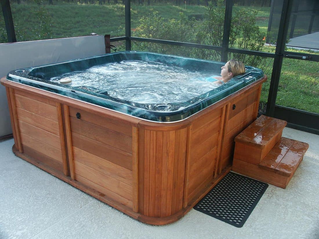 Woman relaxing in the hot tub