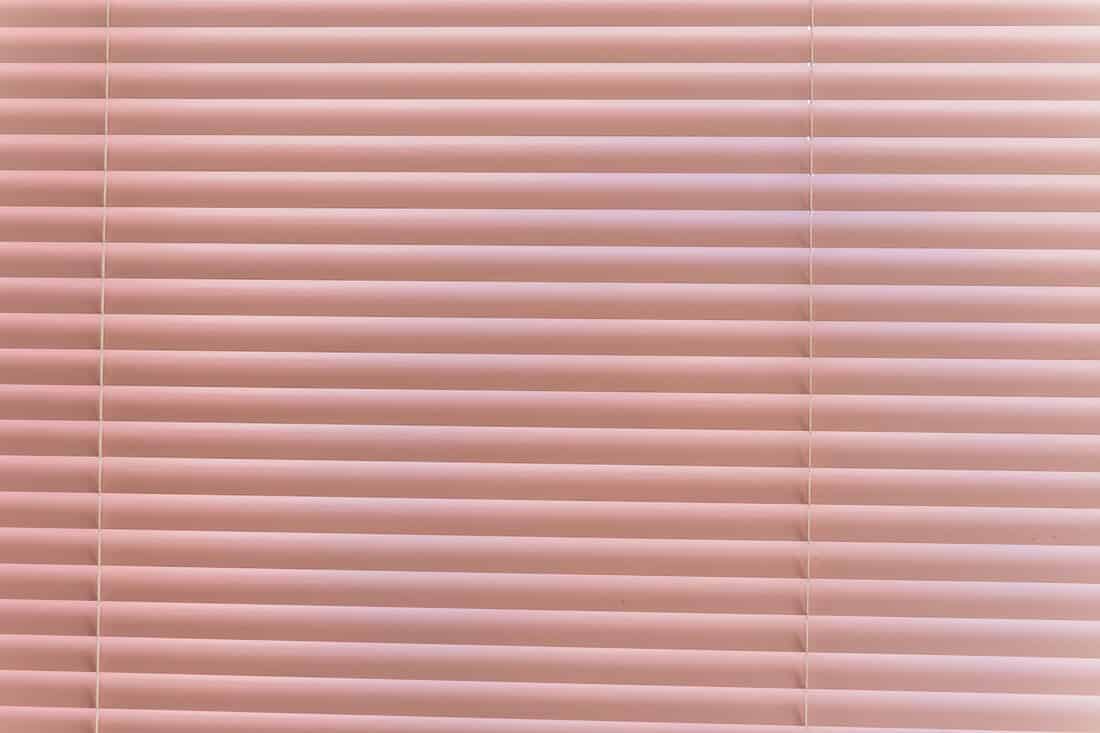 window curtain, venetian blind, pink toned. 