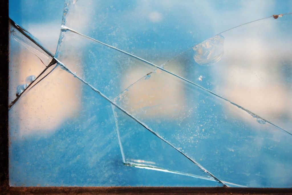 A broken window photographed up close