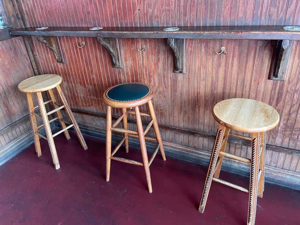 Bar stools for cocktail seating, arranged farther apart