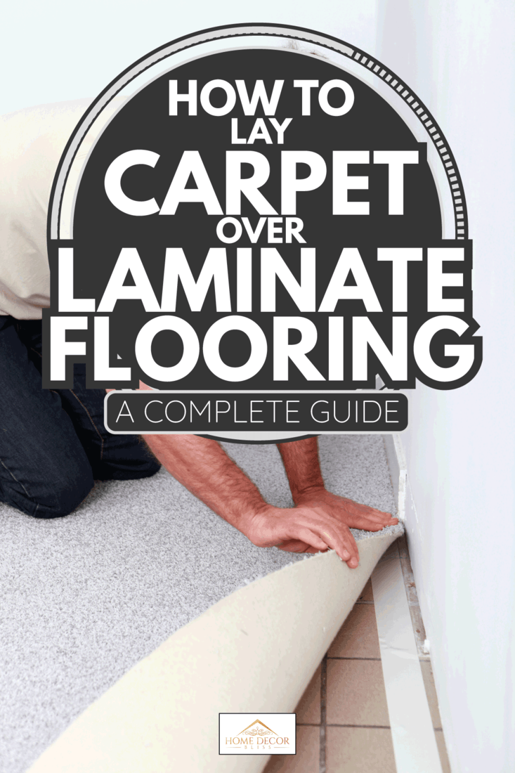Handyman is laying fitted carpet. How To Lay Carpet Over Laminate Flooring [A Complete Guide]