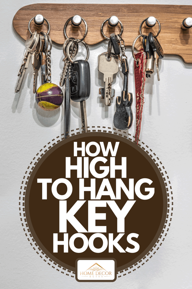 A key holder with keys hanging on the wall, How High To Hang Key Hooks
