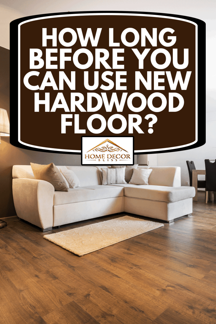 Luxurious living room with kitchen area with hardwood floor, How Long Before You Can Use New Hardwood Floor?