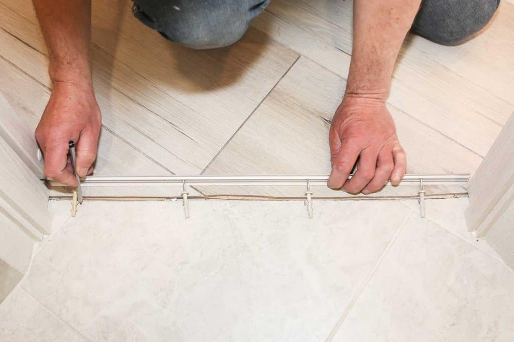 Installation of threshold indoors, How To Install Transition Strips On Concrete