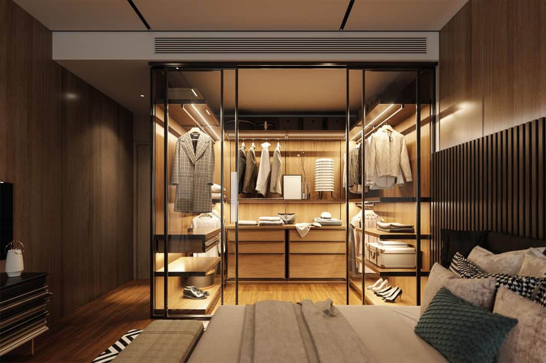 Interior of an empty luxury bedroom with walk-in closet, Do Bedroom Closets Need Doors?