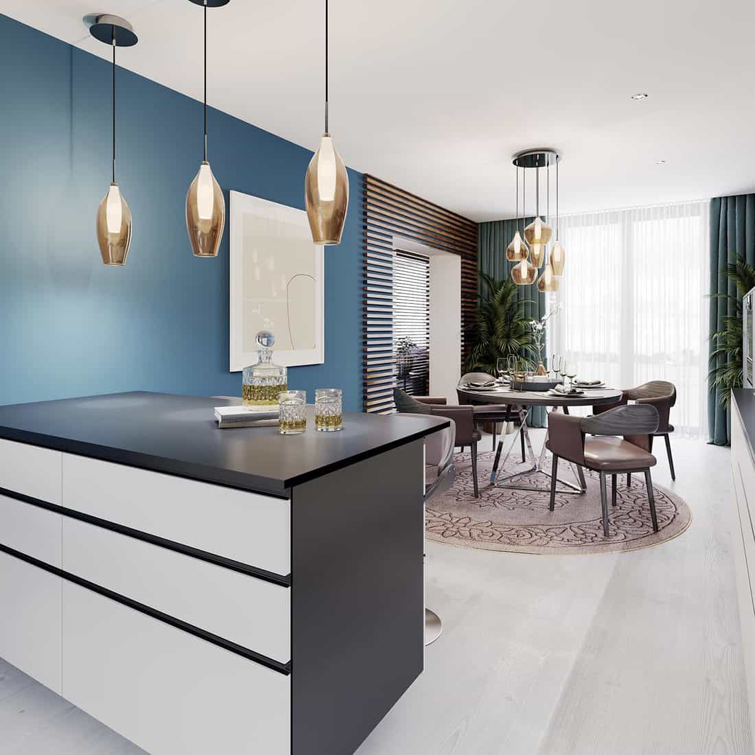 Luxurious multi-colored kitchen with dining tables in a new modern style