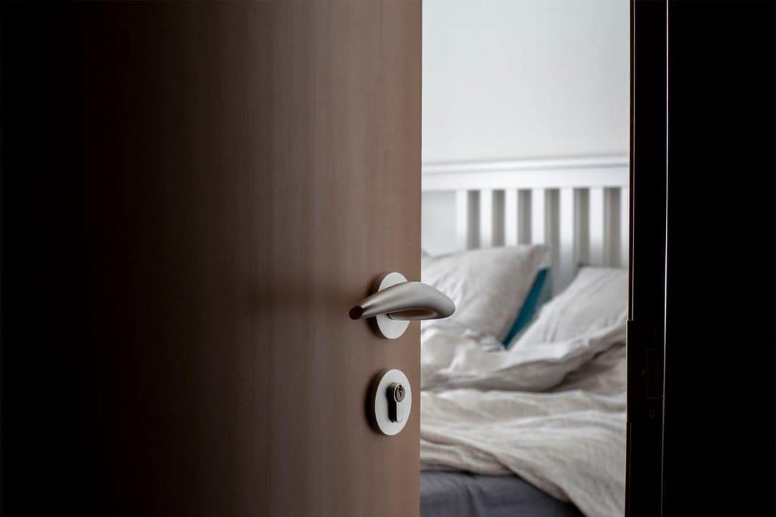 Open door to a bedroom, Bedroom Door Won't Stay Open - What To Do