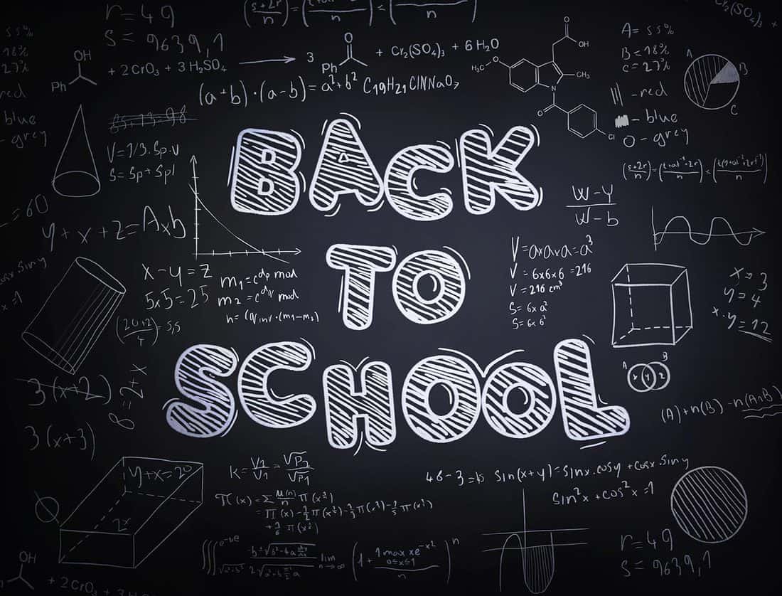 Sketched text and numbers on a blackboard