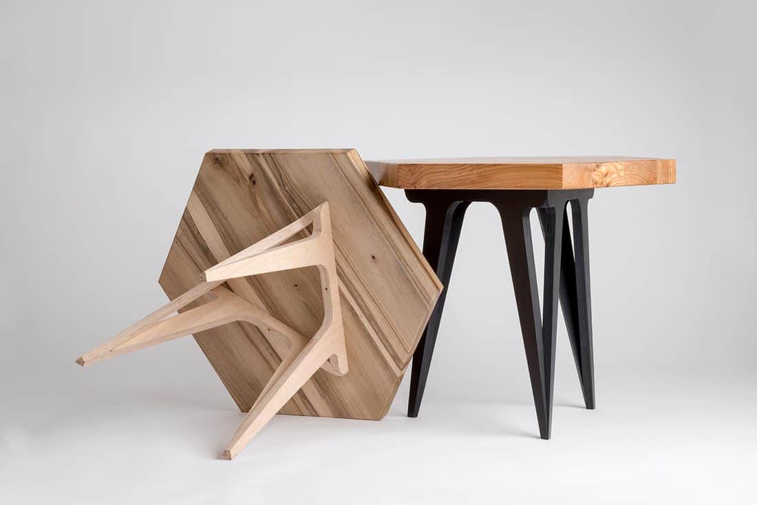 Two modern wooden coffee tables with hexagonal tops