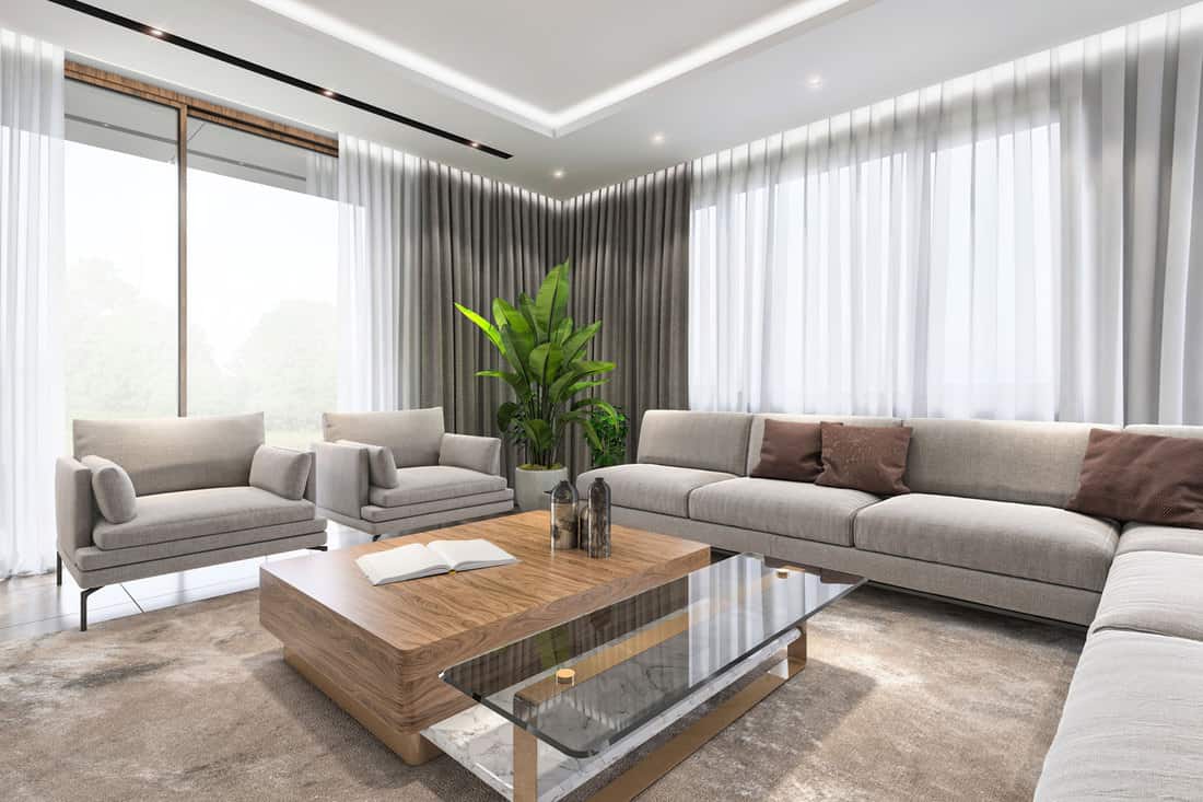 A luxurious apartment living room with long sectional sofas and a big wooden coffee table, What Color Should I Paint A Room With A Lot Of Natural Light?