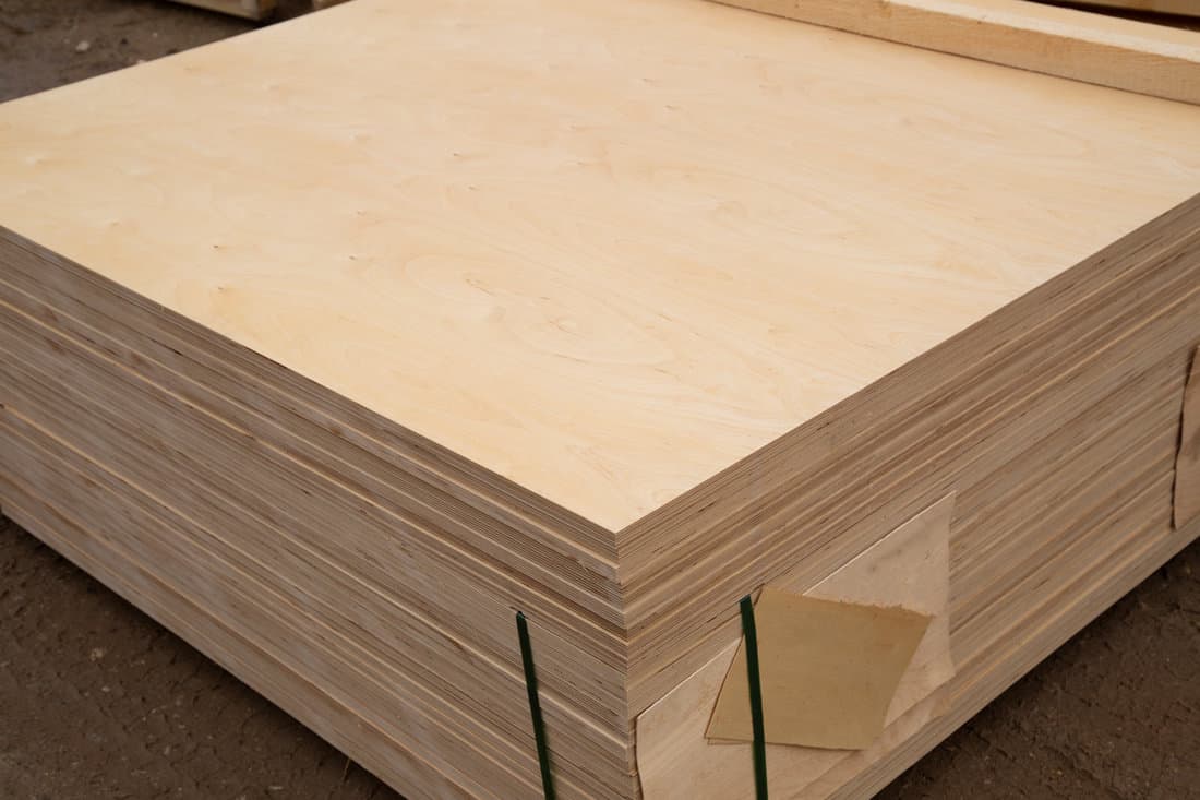 A stockpile of thick plywood