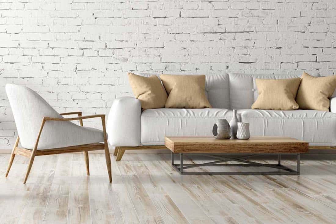 A modern interior of living room with white couch, coffee table and accent chair, What Accent Chairs Go With A White Couch?