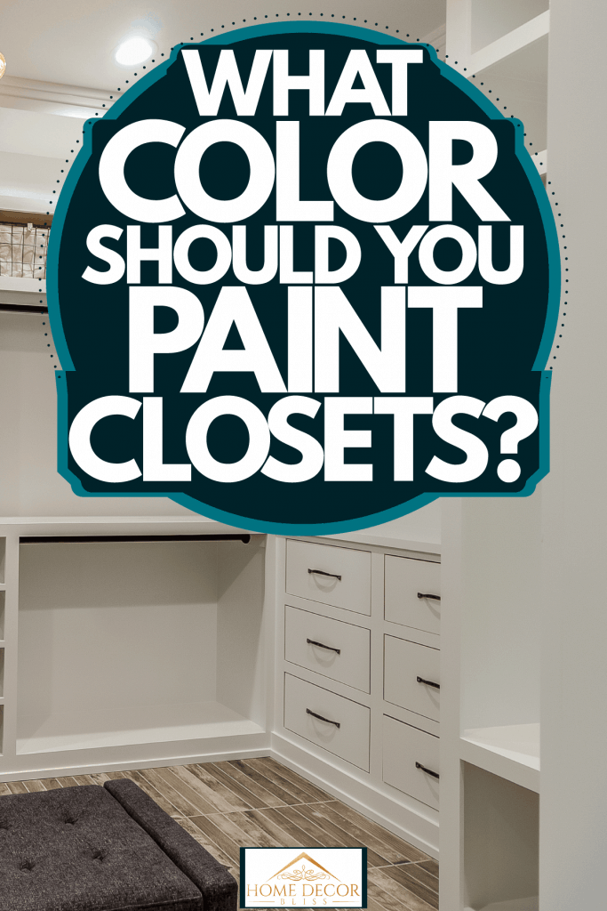 A spacious walk in closet with an abstract looking chandelier, What Color Should You Paint Closets?