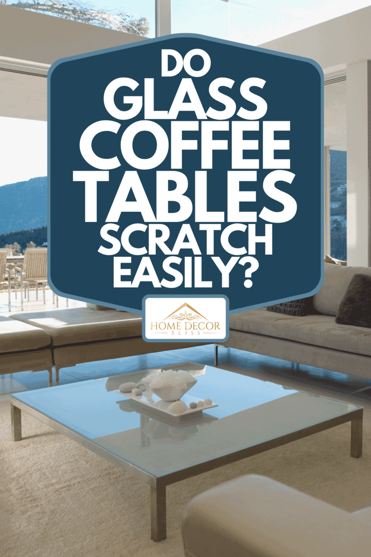A living room in modern home with sofa and glass coffee table, Do Glass Coffee Tables Scratch Easily?