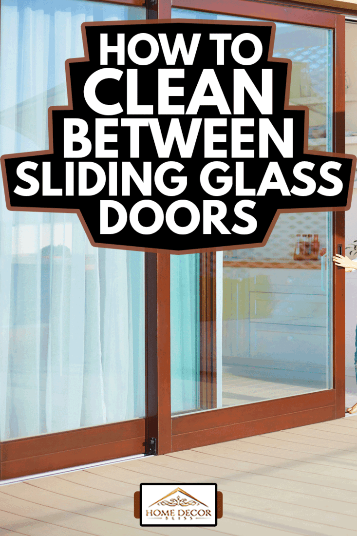  kid opening the sliding door on rooftop patio area at home, How To Clean Between Sliding Glass Doors