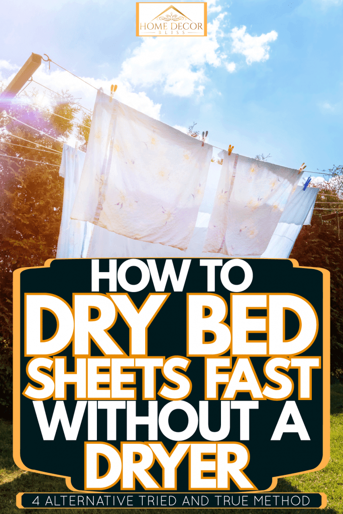 Hanging white bed sheets outside to dry in the sun, How To Dry Bed Sheets Fast Without A Dryer—4 Alternative Tried And True Methods