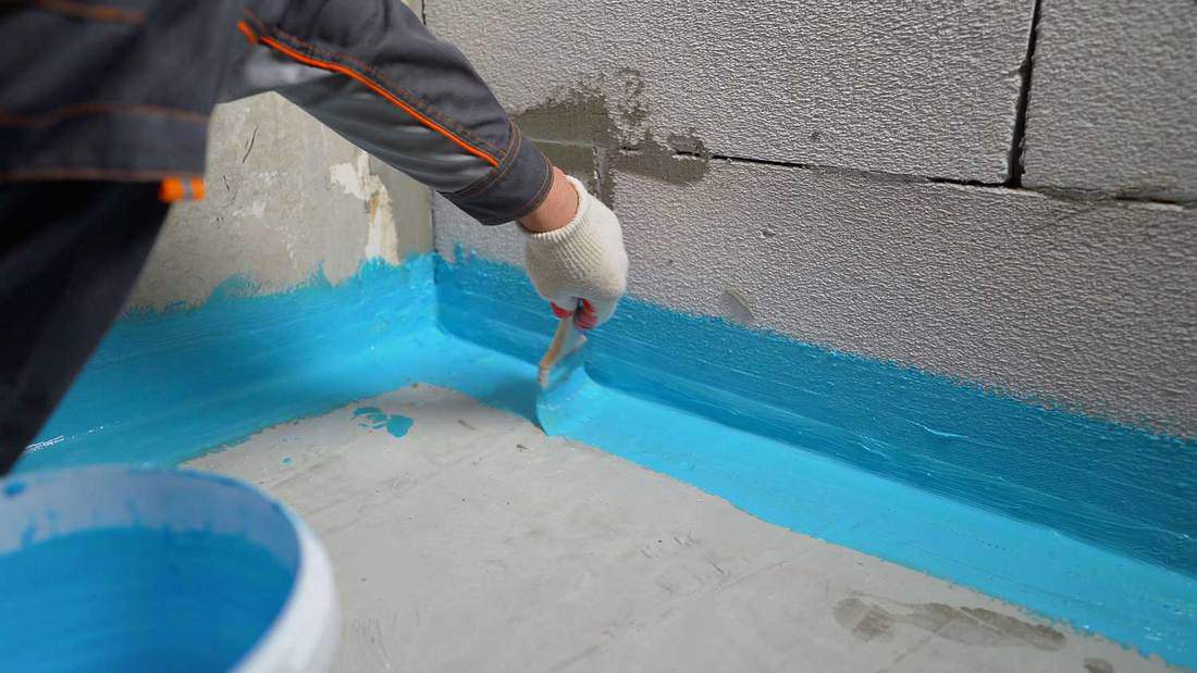 Cover the concrete wall with a cement-polymer waterproofing membrane