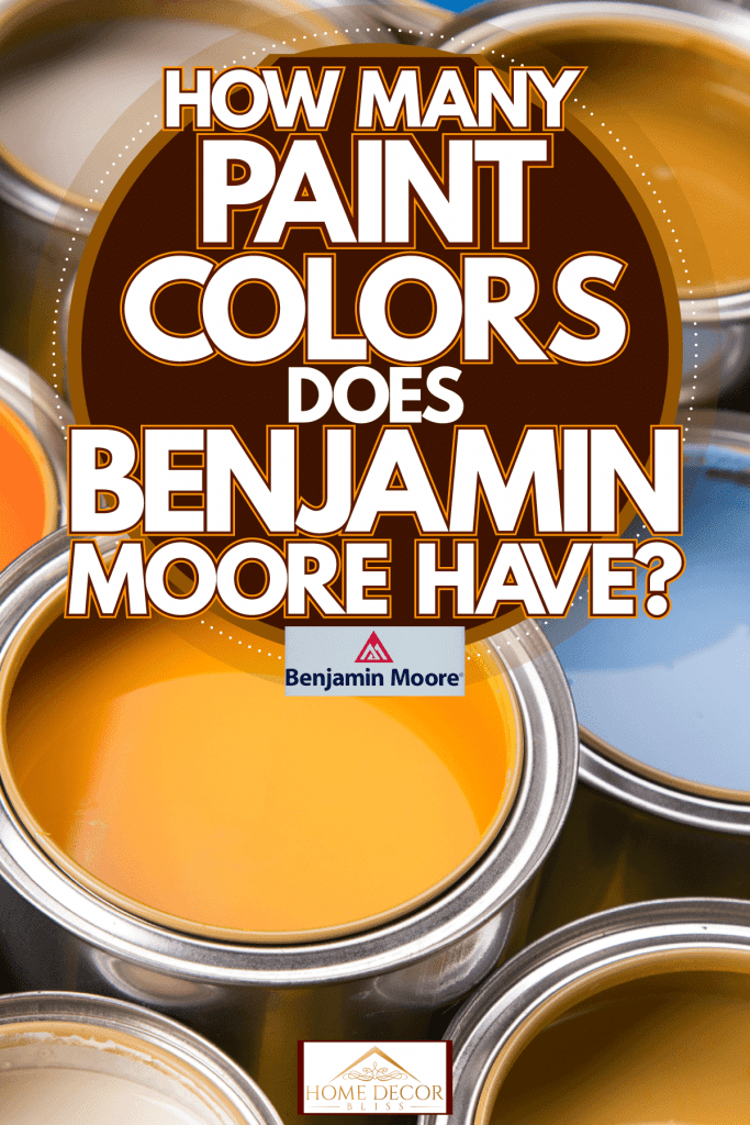 Metal paint cans with a Benjamin Moor logo on the bottom left