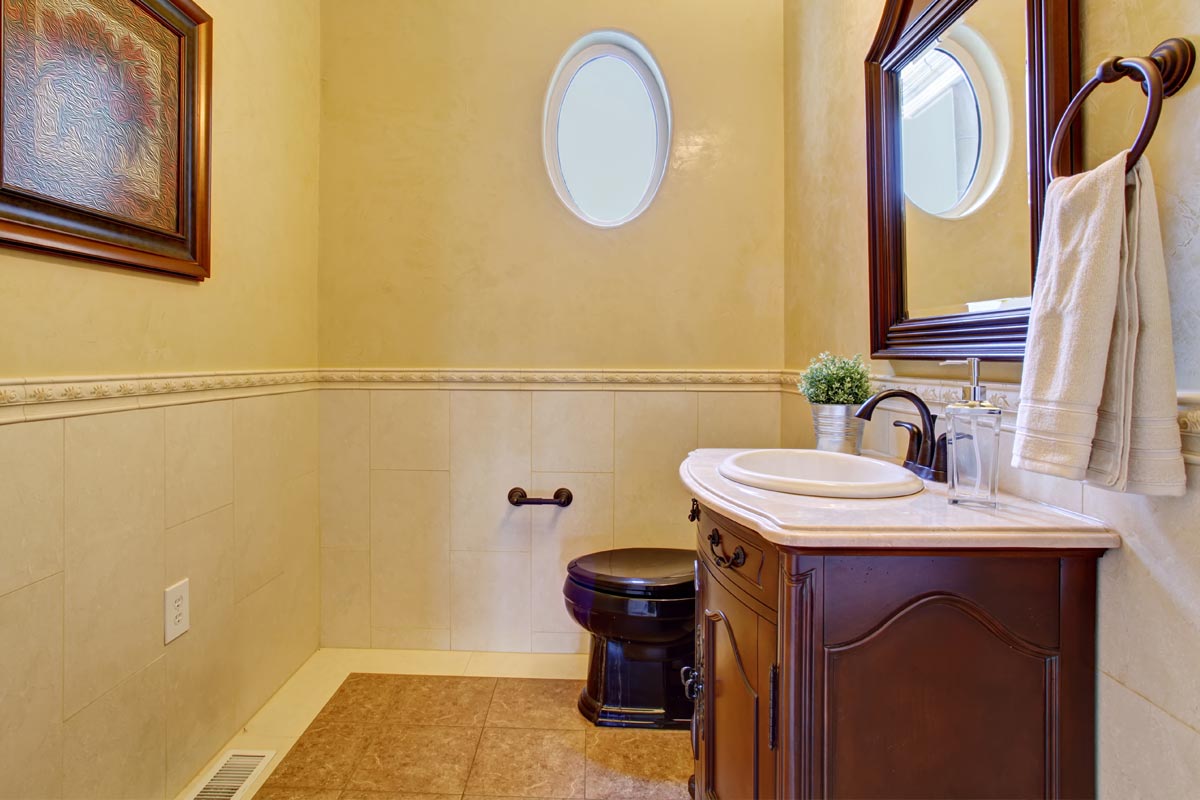 Classy half bathroom with small oval window, How Big Is A Typical Half Bathroom: Dimensions Explored