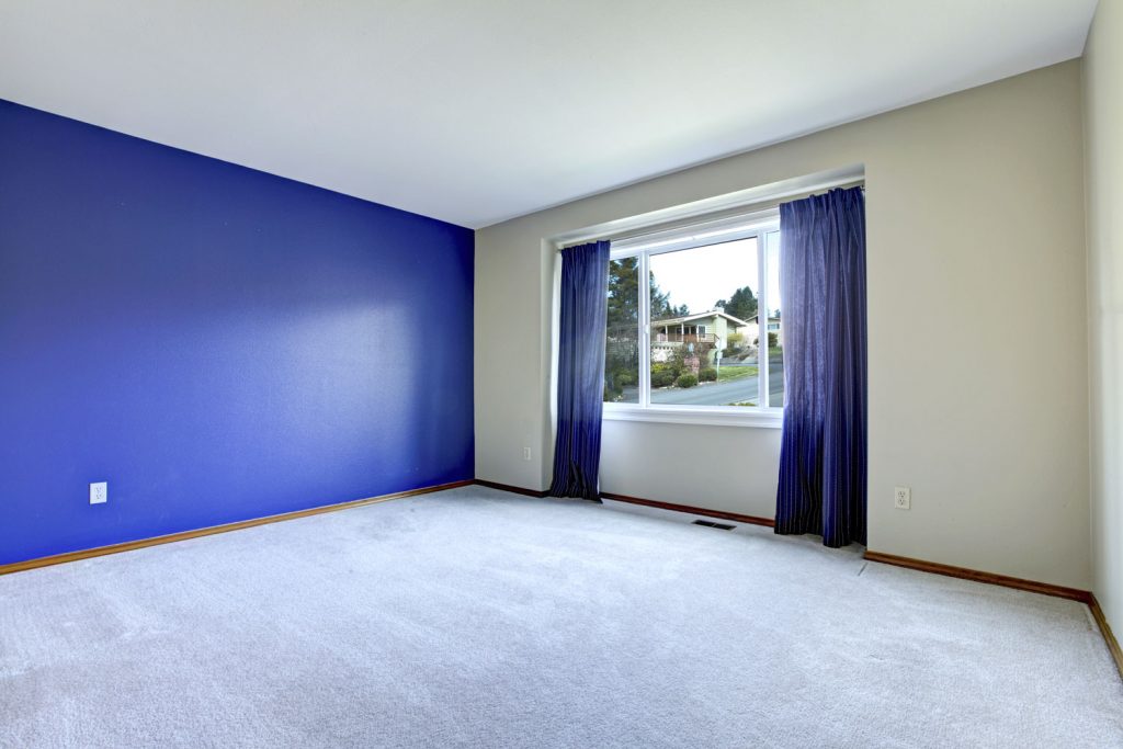 Empty room with lavender carpet floor