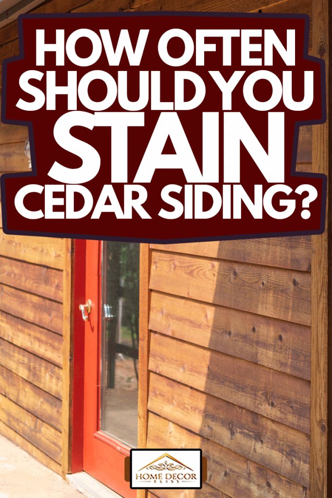 cedar sided house with red door, How Often Should You Stain Cedar Siding?