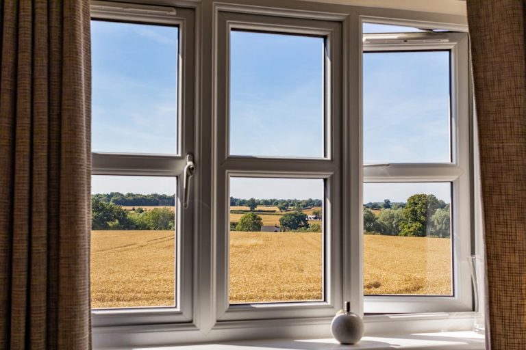 View through the window to field, Types And Brands Of Casement Windows