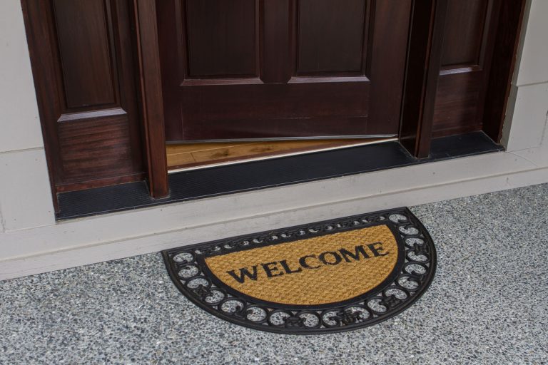 Welcome door mat with open door, How Big Should A Doormat Be? [Standard Sizes Explored]