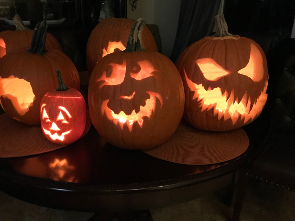 Lit up carved pumpkins