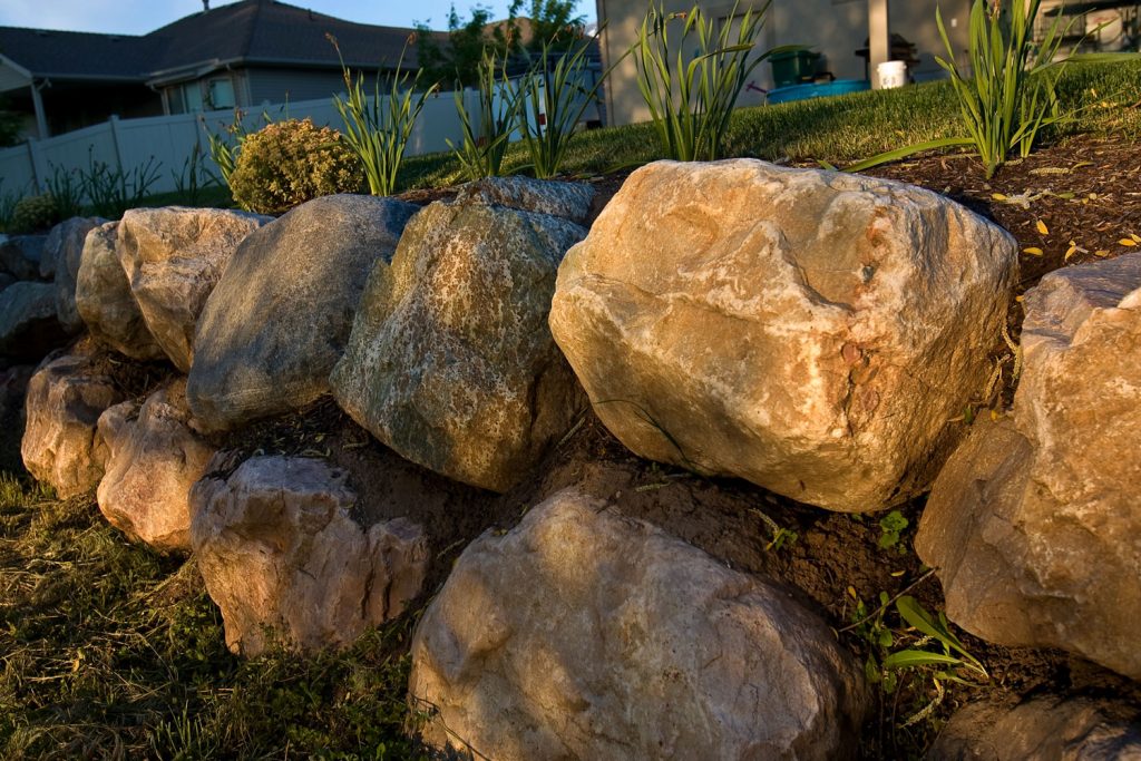 Huge boulders used for a retaining wall