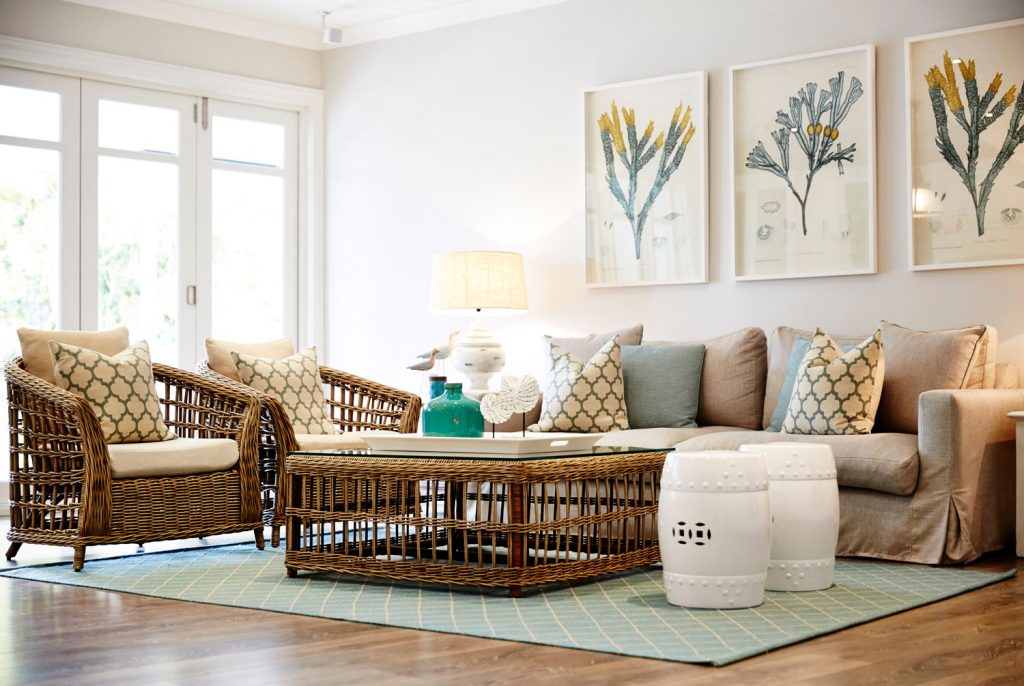 Interior photography of a Hampton's style lounge room with cane furniture