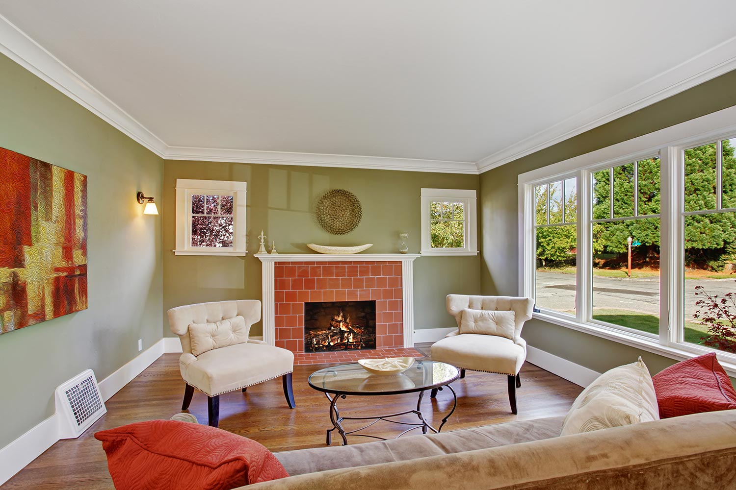 Olive tone family room with fireplace