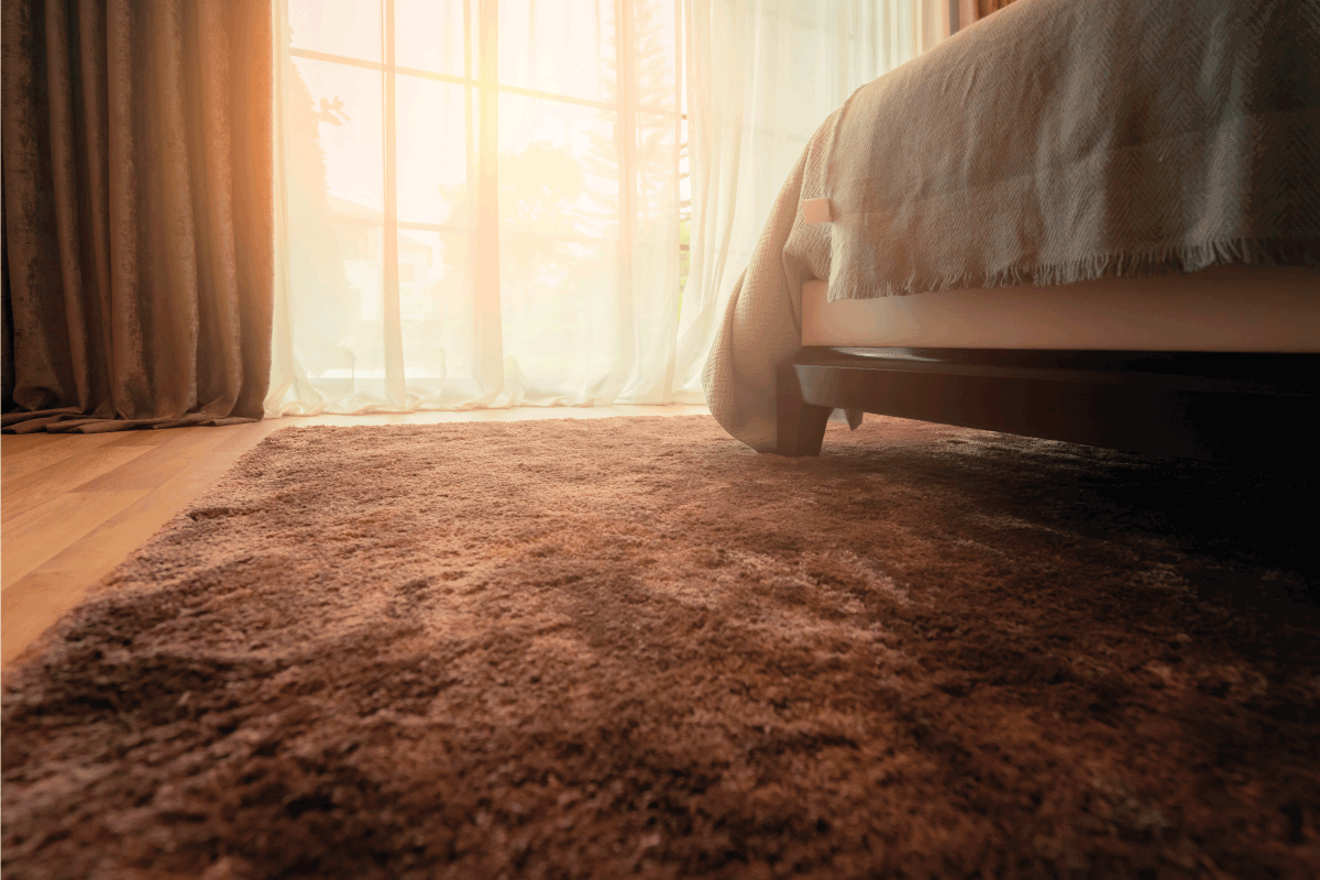 Synthetic carpet on the laminate in the home interior. 12 Most Plush Types of Carpet [By Fiber And Pile]
