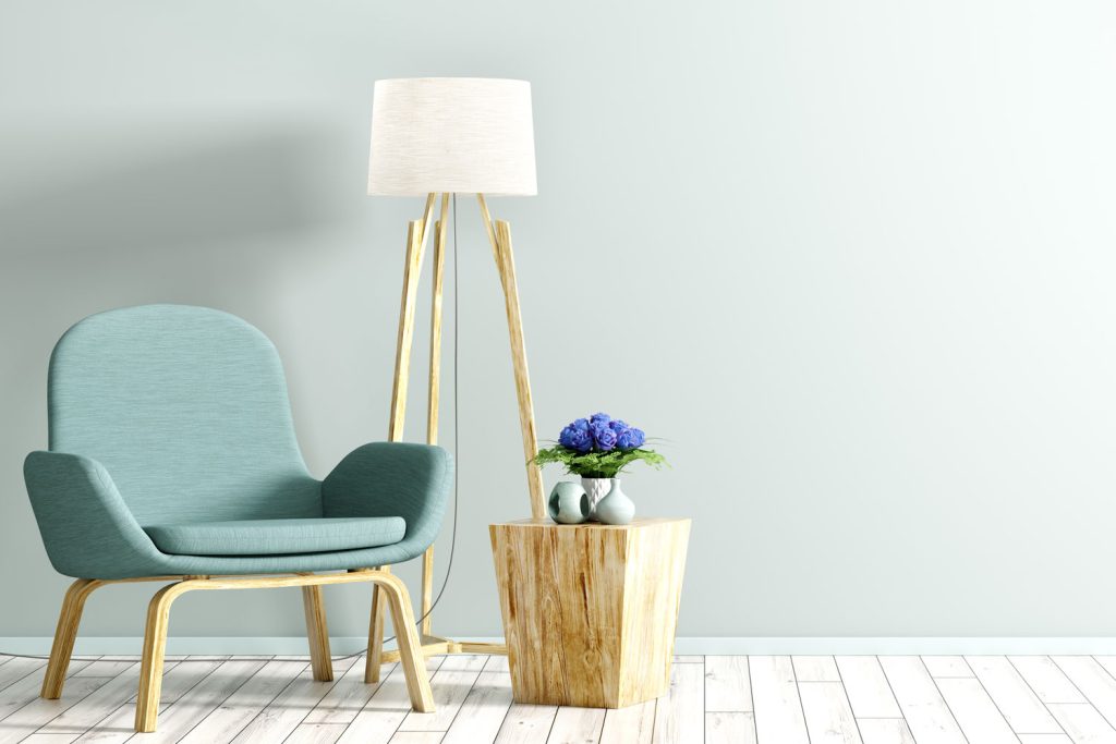Teal colors and wooden furnitures inside a bright living room