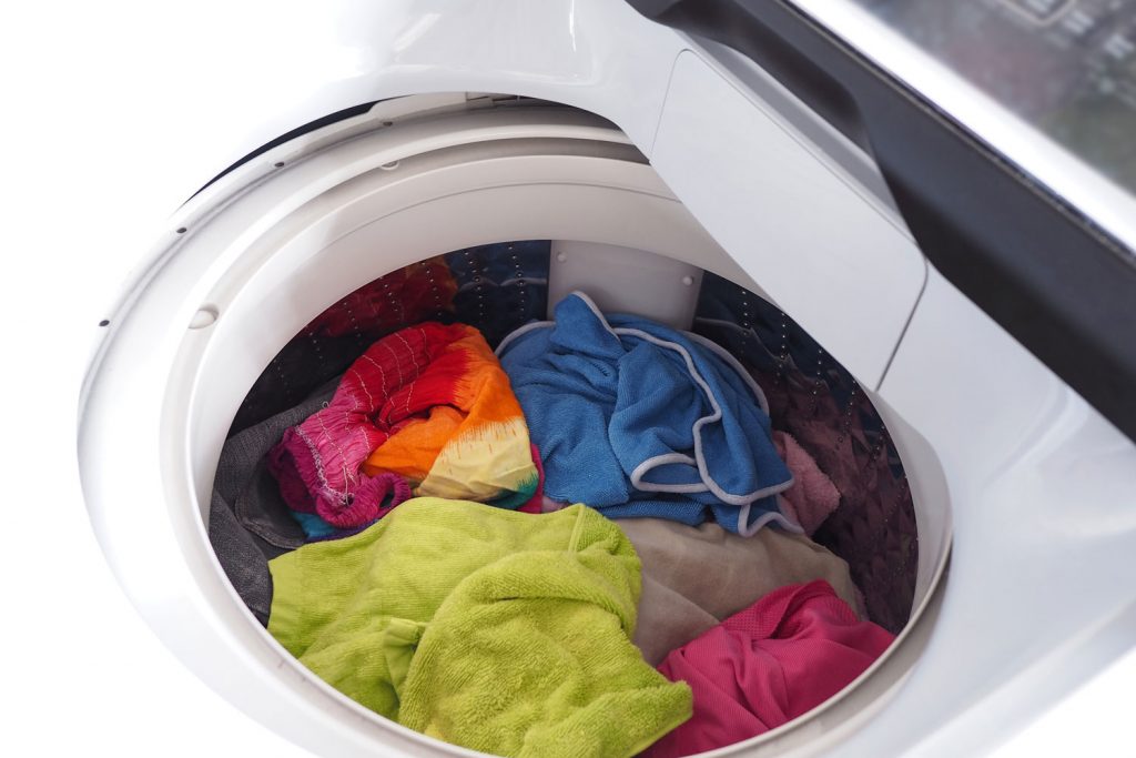 Washing machine filled with cloths
