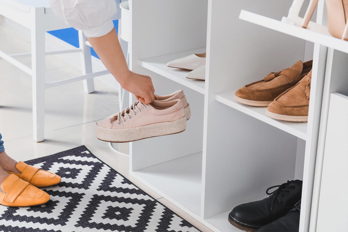 Elegant shoes on a shoe rack shelf, How Deep Should A Shoe Rack Shelf Be?