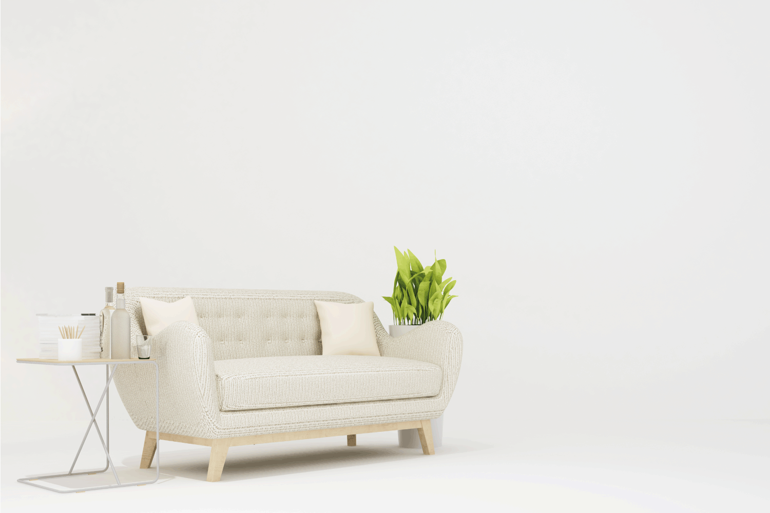 white sofa with english arm on white walled room table on the side and potted plant
