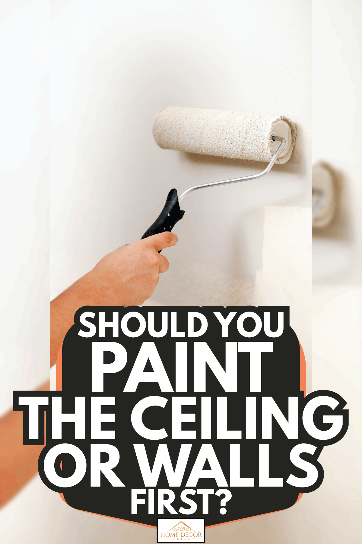 Painting the wall with roller. Should You Paint The Ceiling Or Walls First