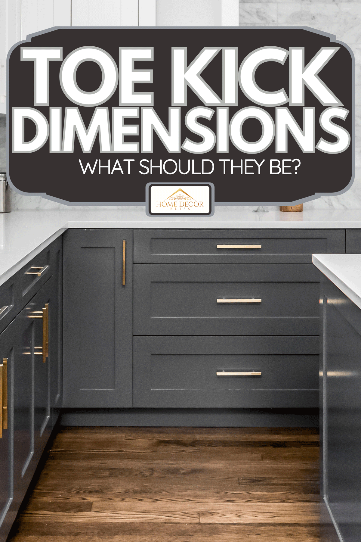 Grey kitchen cabinets with white marbled granite counter tops, Toe Kick Dimensions: What Should They Be?