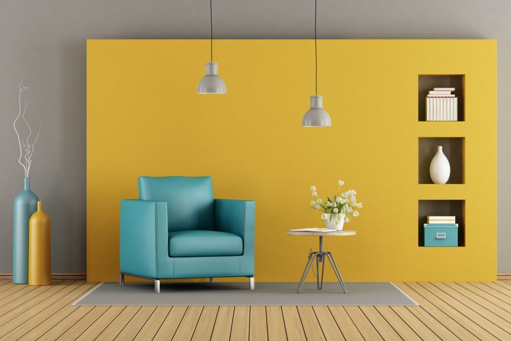 Yellow accent walls with modern furniture's and dangling lamps