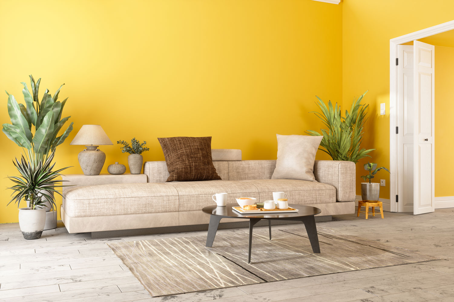 Yellow colored living room with a beige sofa with tan and brown throw pillows