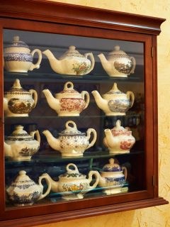 A wooden framed China Cabinet, What To Put In A China Cabinet [Besides China!]