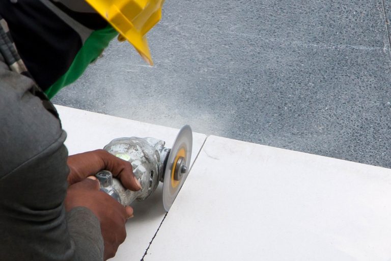 Construction worker using a sanding disk in cutting the cement board, Can Cement Board Get Wet?