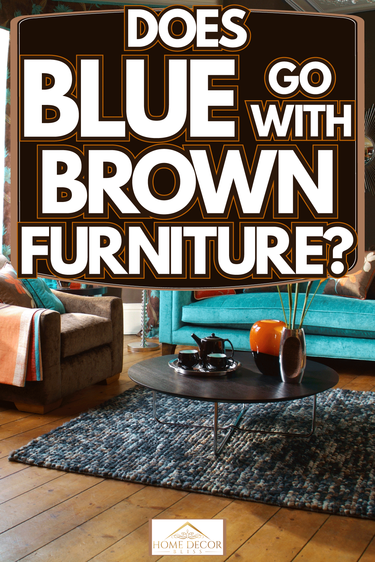 Wooden flooring of a living room with brown and blue sofa with bright colored throw pillows, Does Blue Go With Brown Furniture?