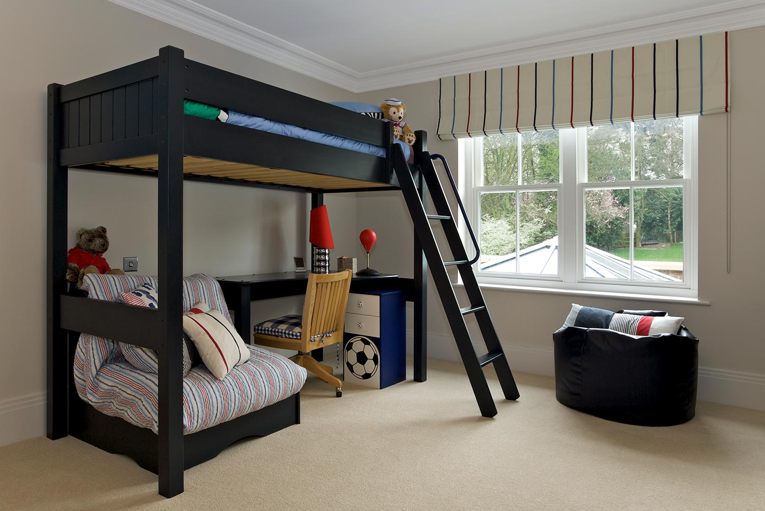 Large wooden framed bunk bed is located in the corner of the room adjacent to a large window overlooking the garden