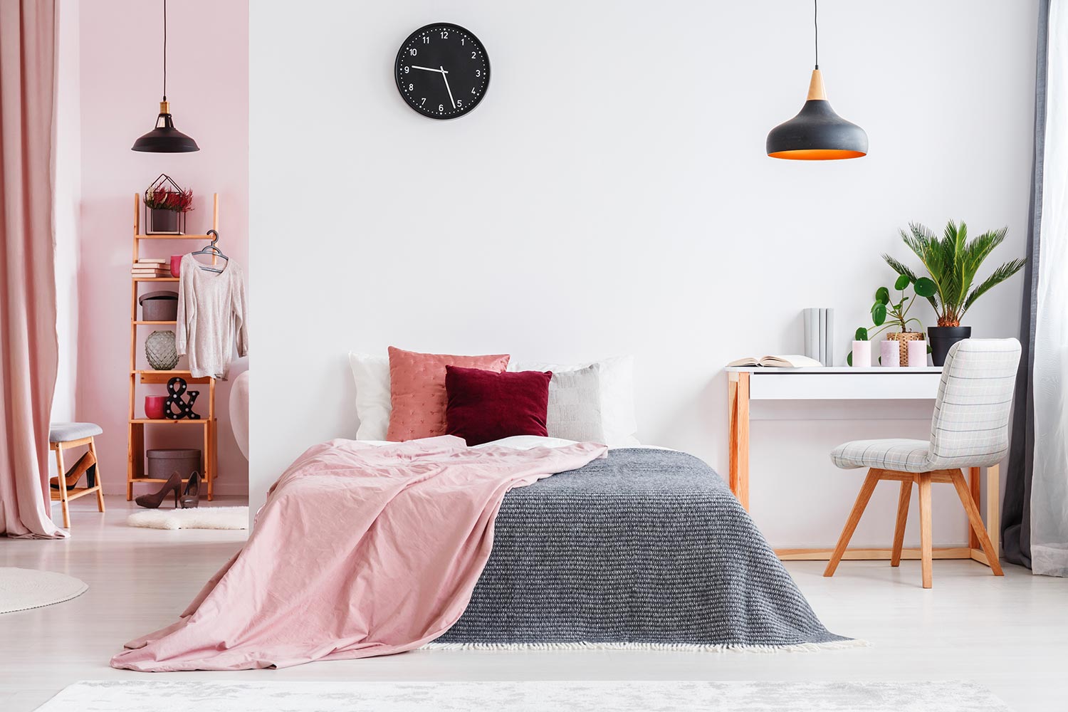Pink bedroom interior with chair